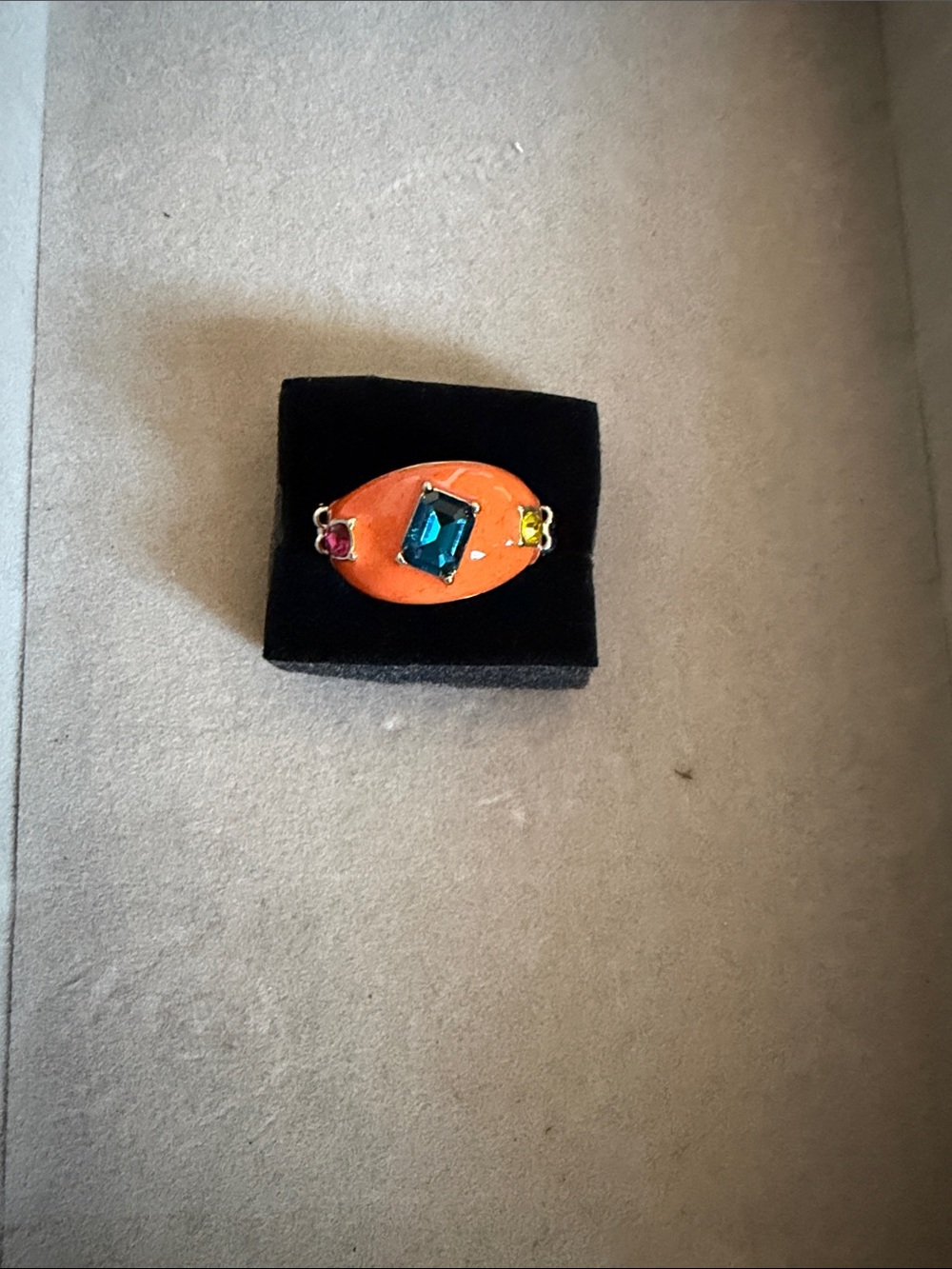 Vibrant Orange Enamel Ring with Blue Center Gem